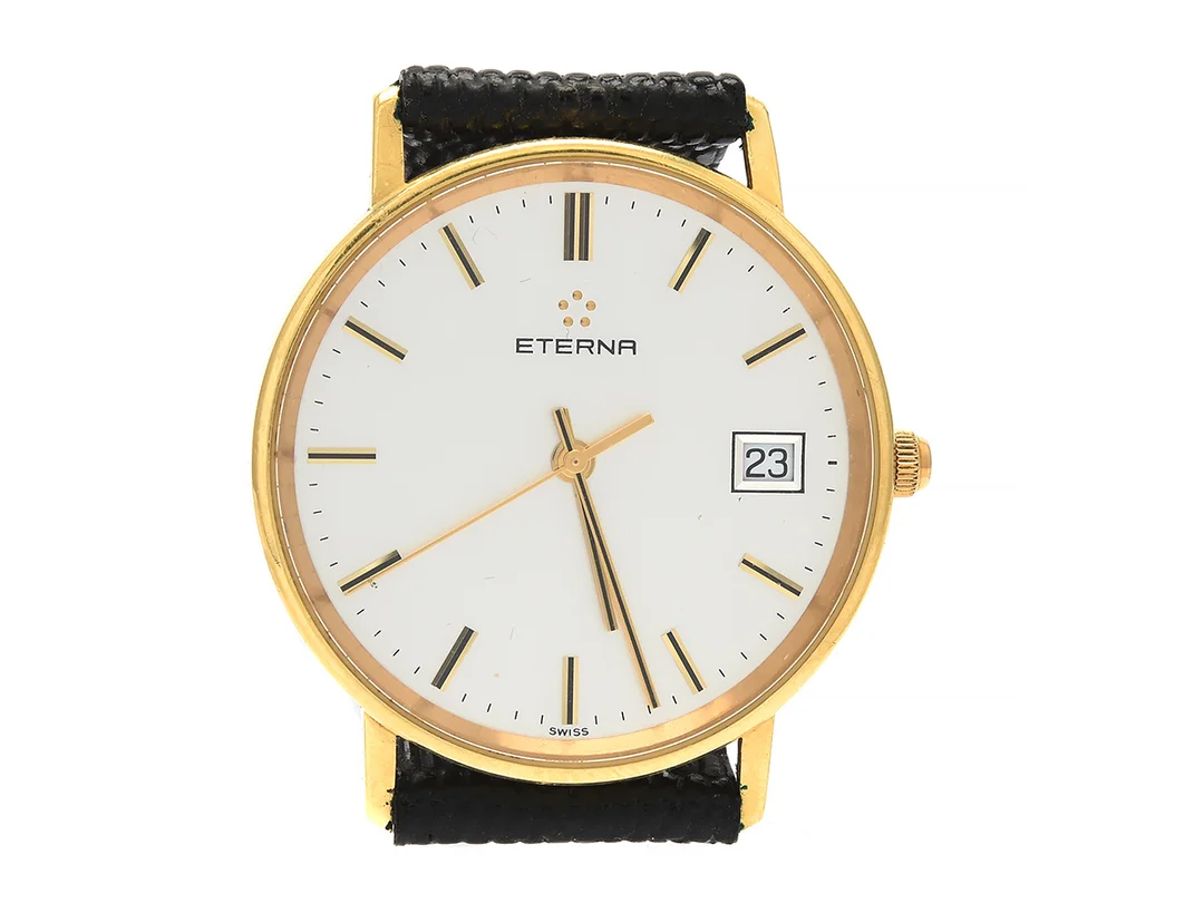 ETERNA 18K quartz med datum, läderarmband (slitet efter spännet) Ø34mm, (behov av batteribyte) — Klockor/Eterna — Kaplans