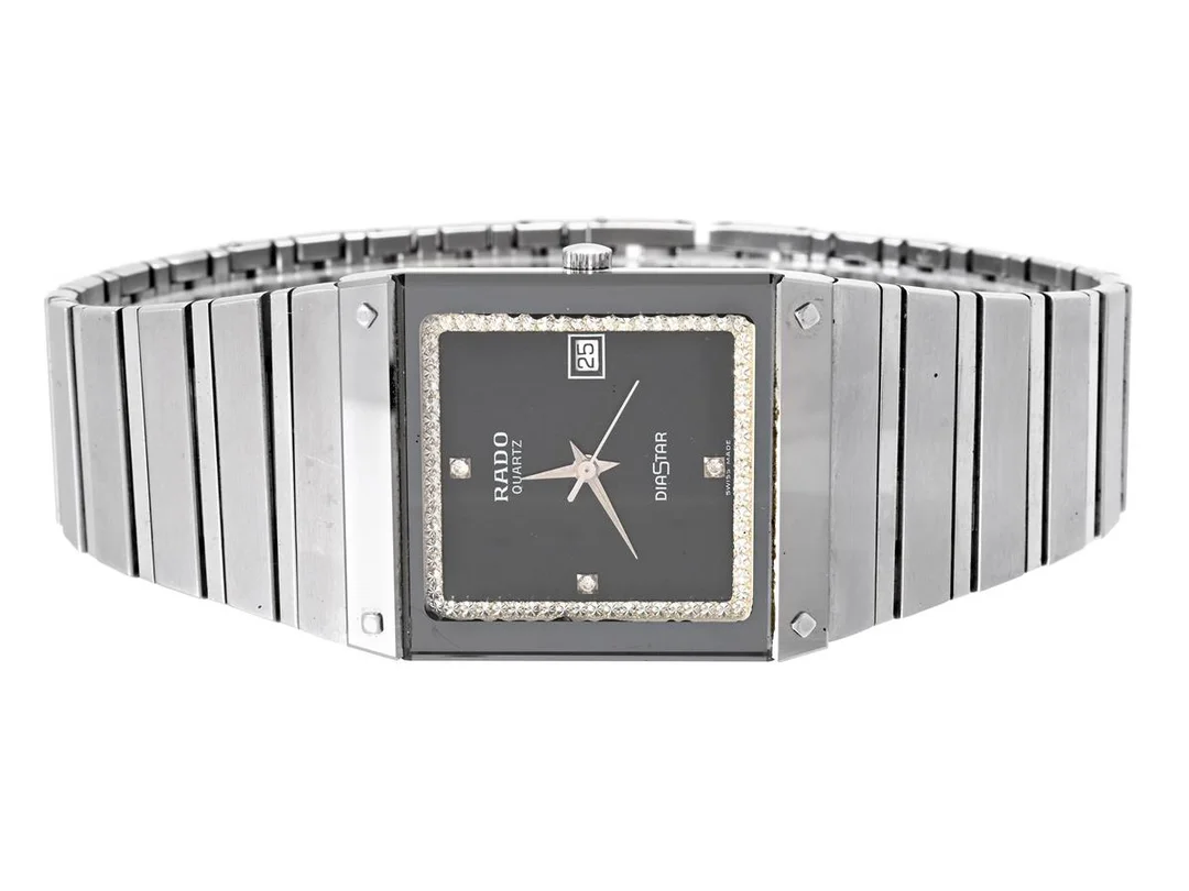 RADO, Diastar, Serie nr. 23711525, Boett nr. 129.0194.3, herrur, 26,5 x 32,5 mm, stål, quartz, safirglas (nagg), datum, skadad urtavla, gravyr, integrerad originallänk, viklås, Ref nr. 04088, längd 195 mm, ca 1990. — Klockor/Rado — Kaplans