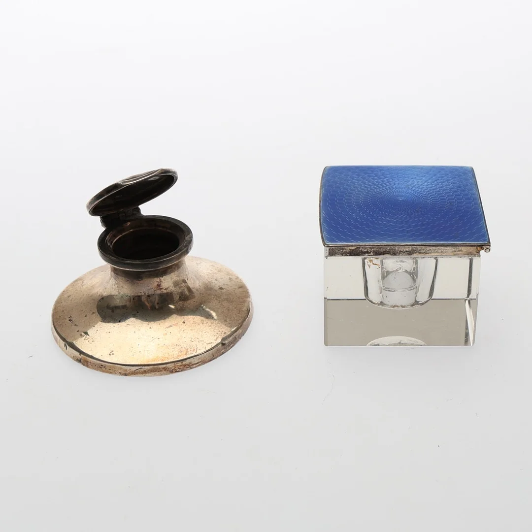 GEORGE V SILVER, BLUE ENAMEL, AND GLASS INKWELL, AND ANOTHER INKWELL. (2). — Silver — Young's Auctions