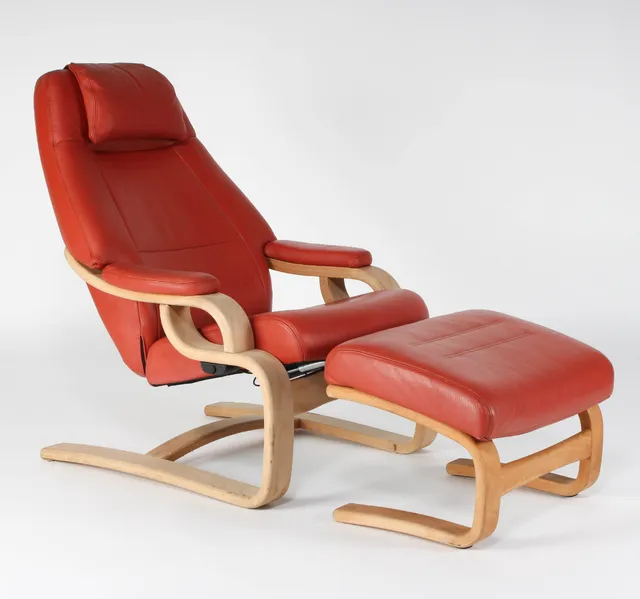 Skippers Furniture. Leather armchair with stool (2)