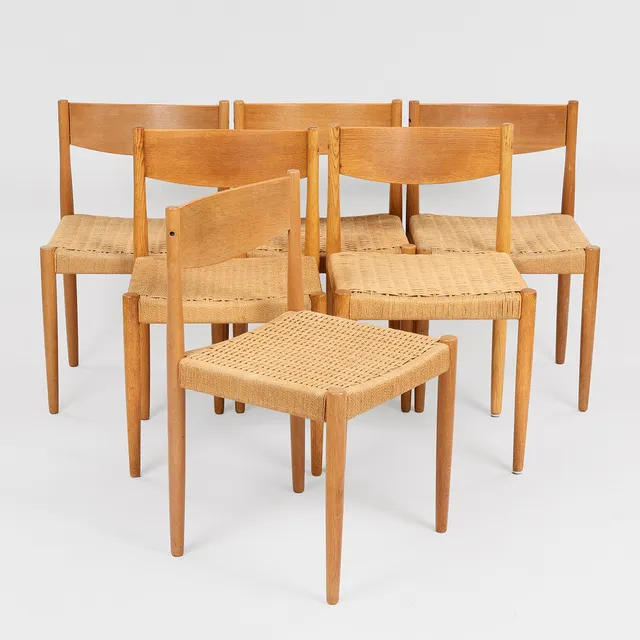POUL M. VOLTHER (1923-2001). Seks spisestole af massivt egetræ og flettet papirgarn. Fremstillet hos Frem Røjle. 1960'erne. Danmark (6).