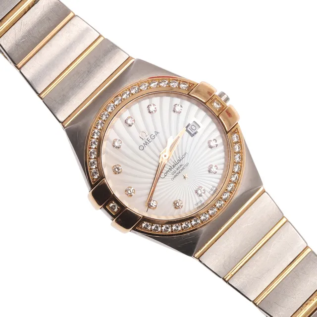 A LADY'S STAINLESS STEEL, GOLD AND DIAMOND CONSTELLATION CO-AXIAL CHRONOMETER WRISTWATCH BY OMEGA.