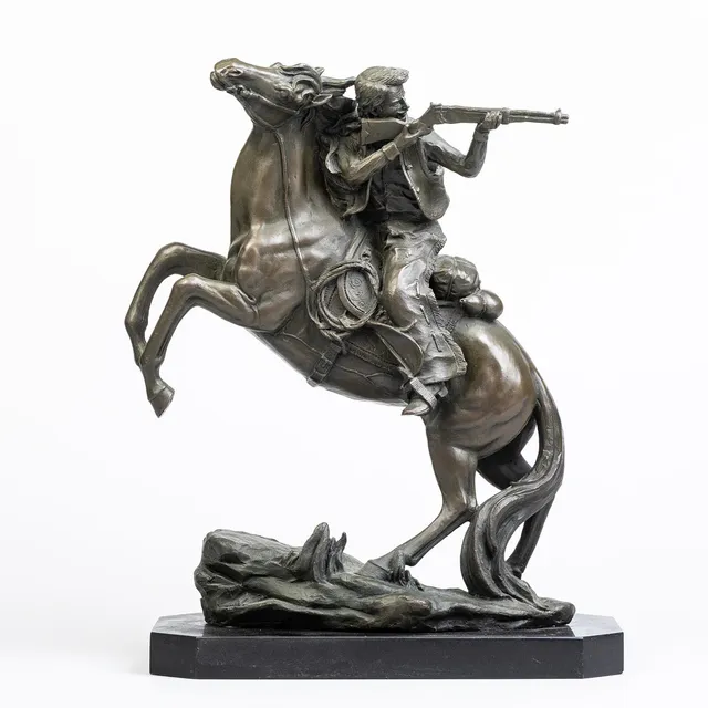 CONTEMPORARY BRONZE SCULPTURE OF A GUNMAN ON HORSEBACK.