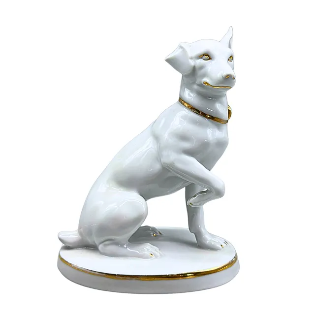 PORZELLANHUND MIT GOLDENEN AKZENTEN.