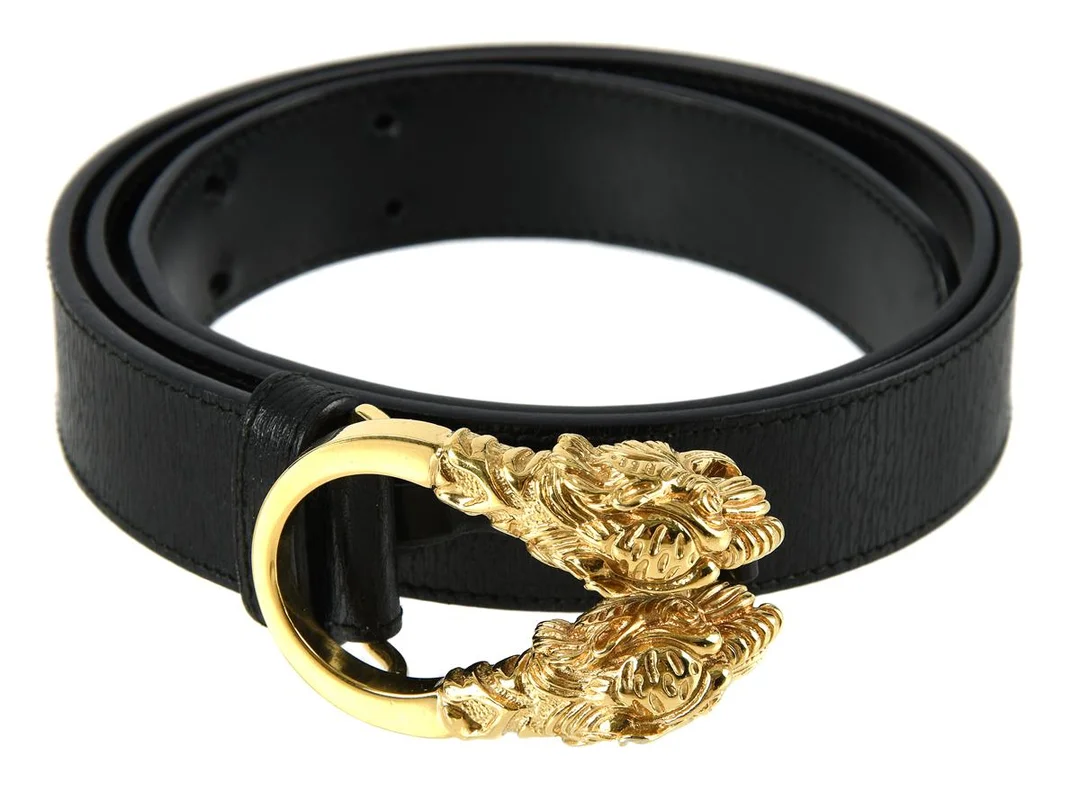 BÄLTE, GUCCI, guldfärgat spänne med tigerhuvud, svart läder, längd 75cm, breee 2,5cm. — Accessoarer/Bälten — Kaplans