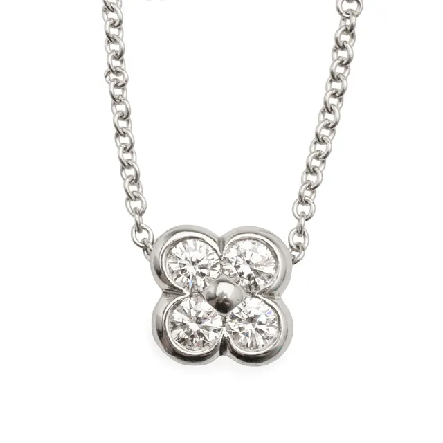 TIFFANY & CO. “ Flower” vedhæng i halskæde med fire brillantslebne diamanter af platin. 0,12 ct.