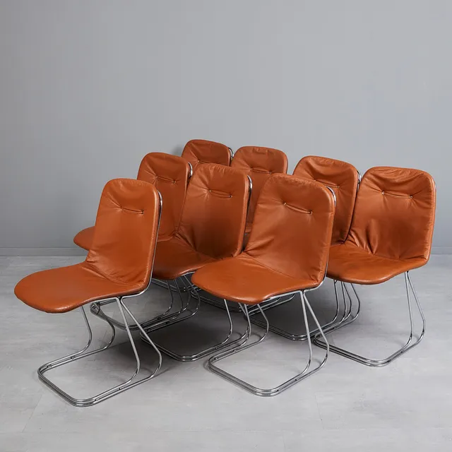 GASTONE RINALDI. IM STIL VON. Acht Freischwinger Stühle / Stühle, Stahl, verchromt, Leder, 1970er/80er Jahre (8).