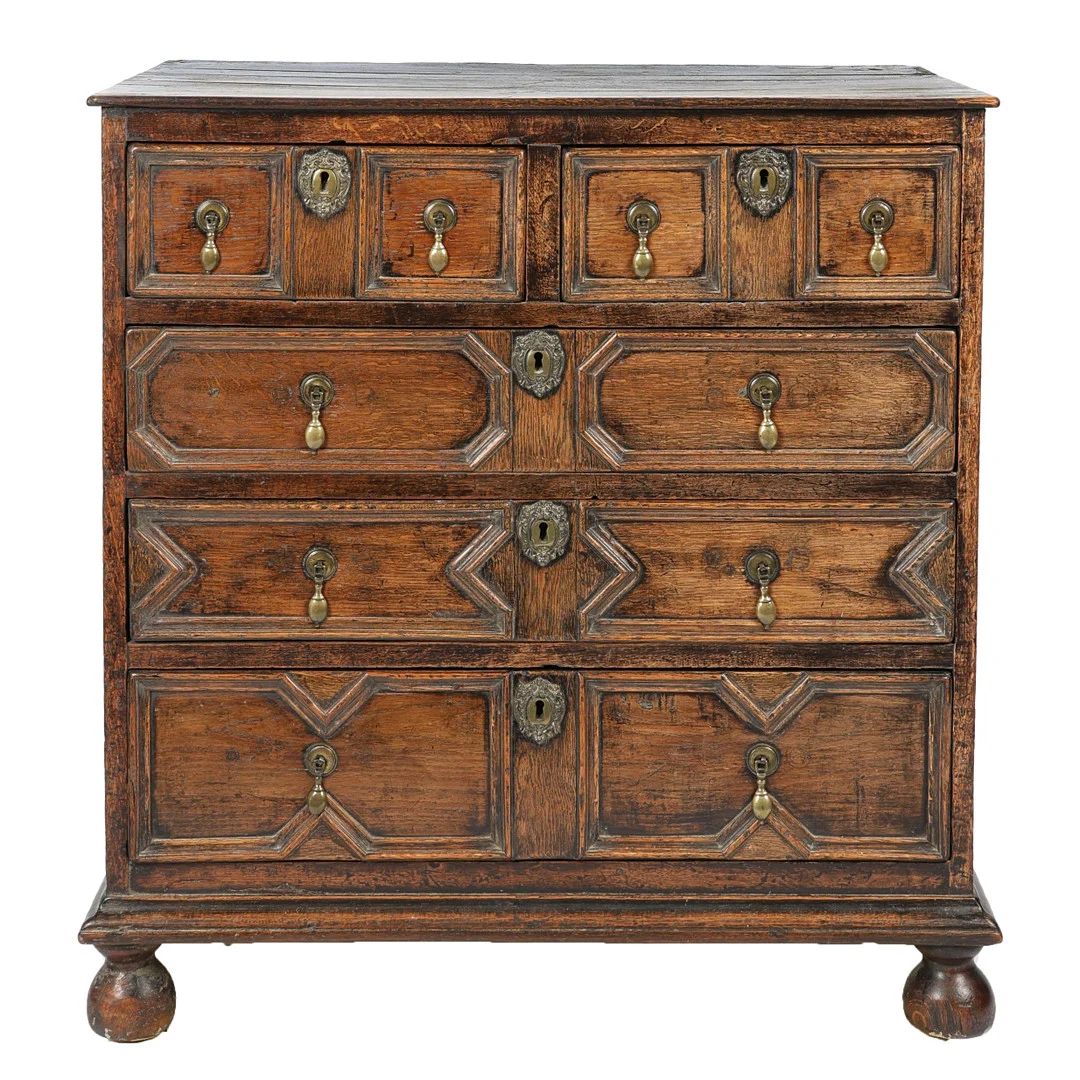 A CHARLES II OAK GEOMETRIC CHEST OF DRAWERS, CIRCA 1680. — Chests of drawers — Bishop & Miller