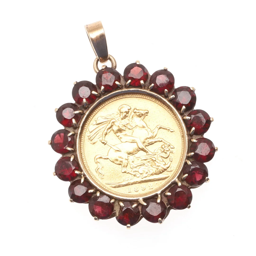 A GOLD SOVEREIGN AND GARNET PENDANT. — Brooches & Pendants — Lawrences Auctioneers