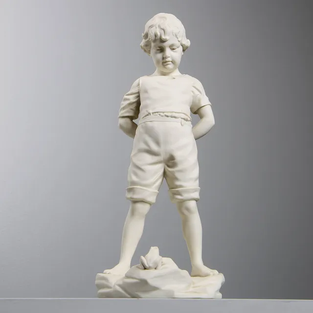 PER HASSELBERG. EFTER. "Pojken och Grodan", skulptur, parian, Gustavsberg, daterad 1904.