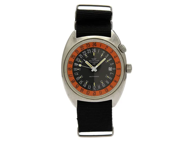 GLYCINE, Airman SST (-T- SWISS -T-), s.k. "Pumpkin", Cal A.Schild 1903, herrur, 41,5 mm, stål, automatisk, plexiglas, datum, 24-timmarsvisning, NATO-band, ca 1968.