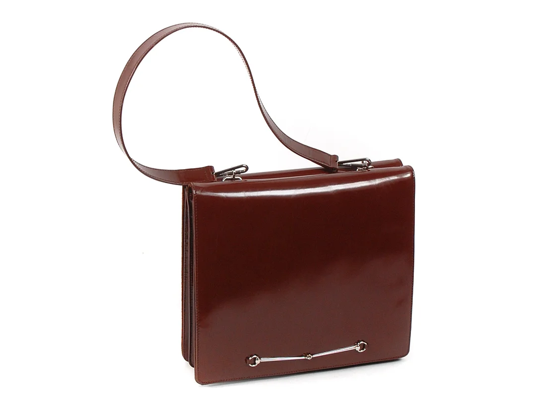 VÄSKA, GUCCI vintage 19070-tal rostbrun läder insida rostbrun mocka, svart läder 25x22x6 cm dustbag väskan har ytliga märken i lädret — Accessoarer/Väskor — Kaplans