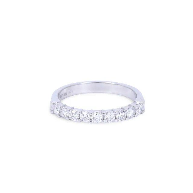 18CT GOLD DIAMOND HALF ETERNITY RING.