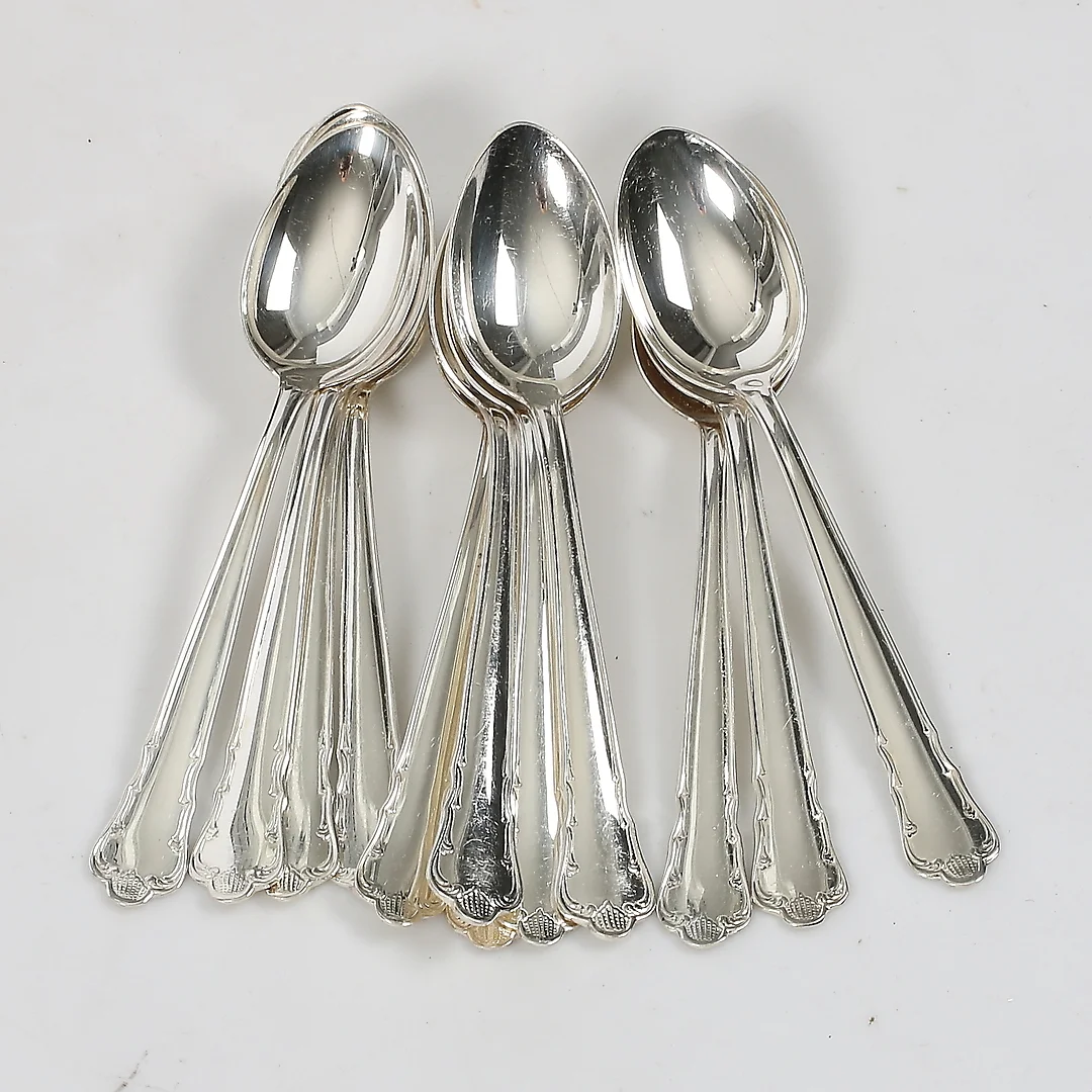 KAFFESKEDAR, 12 st varav 8 st, silver, modell Ingrid, GAB, 1970-tal. Vikt 97,3 gram. — Silver — Stadsauktion Sundsvall