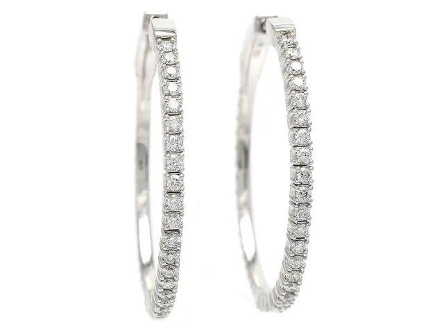 ÖRHÄNGEN, 18K vitguld, 44 briljantslipade diamanter ca 0,80 ctv, ca TW/VVS-VS, flexmodell, diameter 32 mm, vikt 7,8 g.