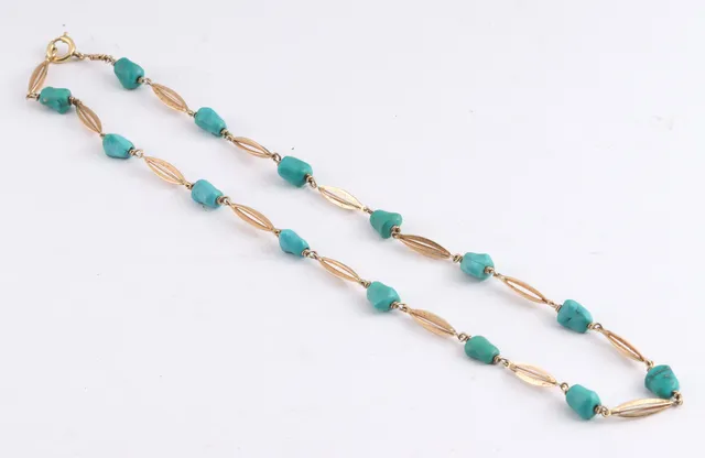 Herman Siersbøl. A necklace of 14 kt. gold with turquoises