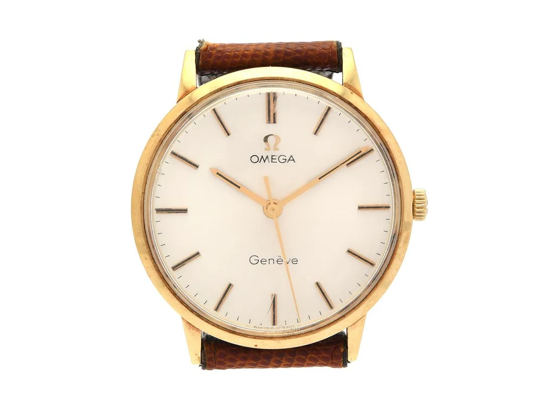 OMEGA, Genève, Cal 601, Serie nr. 31283707, Ref nr. BD 131.0041, Boett nr. 131.041, herrur, 33 mm, 14K guld, manuell, plexiglas, defekt (fjäder av), läderband, ca 1970, box. — Klockor/Omega — Kaplans