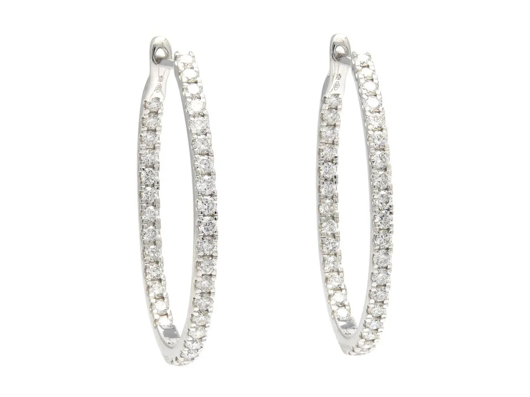 ÖRHÄNGEN, 18K vitguld, 66 briljantslipade diamanter ca 1,04 ctv, ca TW-TCr(G-I)/VS-SI, ca 27x20 mm, vikt 4,0 g. — Smycken/Örringar — Kaplans