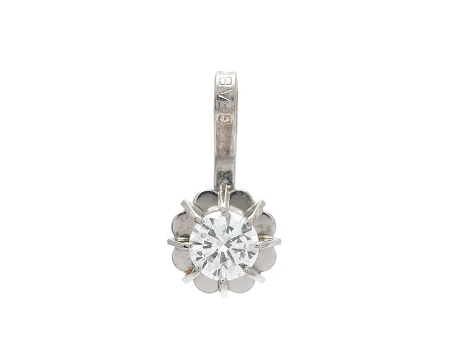 ENSTENSHÄNGE, 18K vitguld, briljantslipad diamant ca 0,16 ct, ca TW-W(G-H)/VS, vikt 0,4 g.