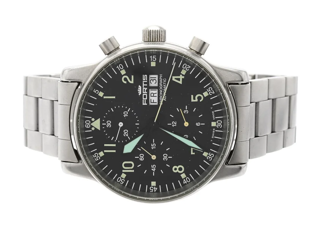 FORTIS, Flieger Chronographe (T Swiss Made T), Cal ETA 7750, Boett nr. 597.10.141, kronograf, herrur, 40 mm, stål, automatisk, safirglas, dag, datum, defekt (går ej, akut servicebehov), utbytta visare, originallänk, viklås, ca 1998. — Klockor/Fortis — Kaplans