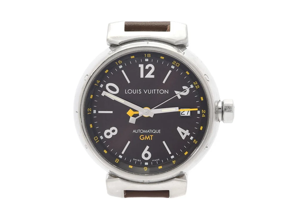 LOUIS VUITTON, Tambour, GMT, Cal ETA 2893-1 Serie nr. DP 3917, Boett nr. Q11310, unisex, 39 mm, stål, automatisk, safirglas, datum, två tidszoner, integrerat läderband, ca 2005, box, ytterkartong. — Klockor/Louis Vuitton — Kaplans