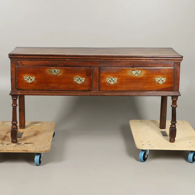 AN EARLY 18TH CENTURY OAK DRESSER BASE.
