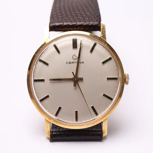 HERRARMBANDSUR, manuell, 18K guld, Certina.
