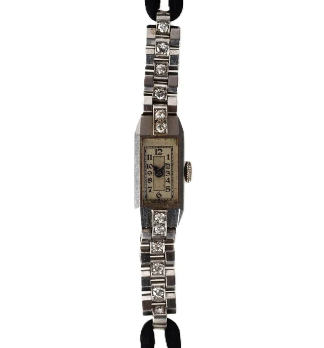 An Art Deco platinum diamond wristwatch.