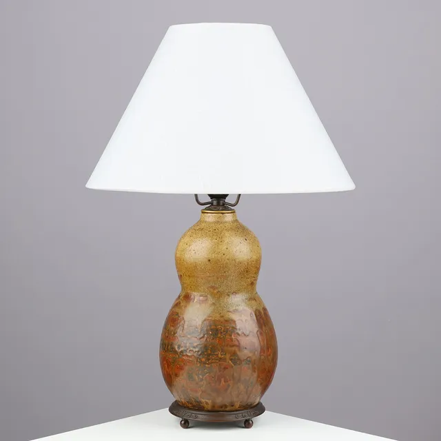 PATRICK NORDSTRÖM. Unique, gourd-shaped stoneware table lamp with burnished brass fittings, Royal Copenhagen, Denmark, dated 1919.