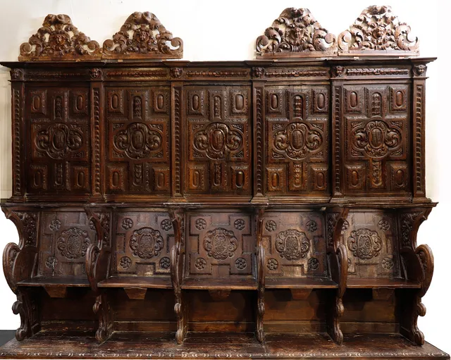 Choir chairs set in walnut, 17th Century.