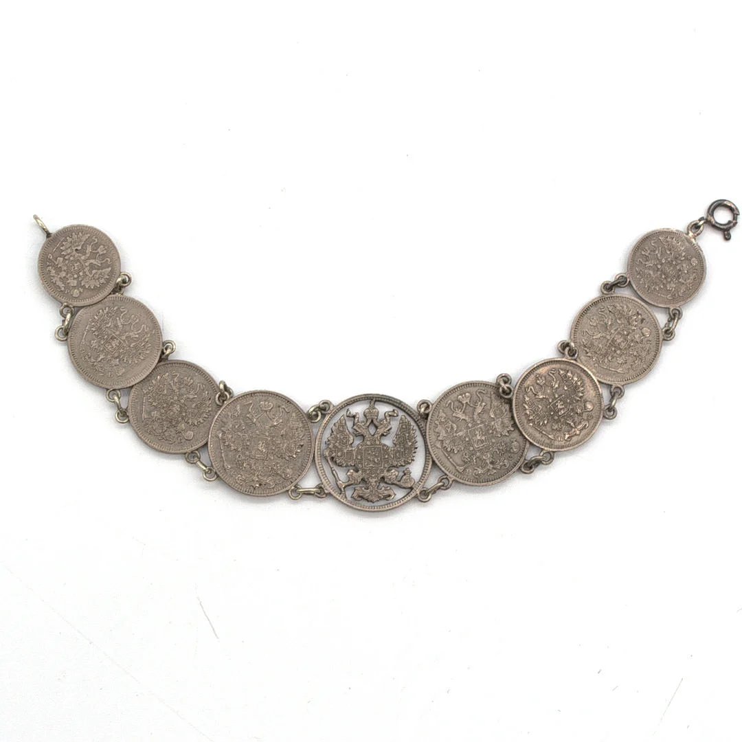ANTIKES RUSSISCHES MÜNZ SILBER ARMBAND, MITTIG DOPPELKOPFADLER, HANDARBEIT, RUSSLAND UM CA. 1914. — Silver — Kunst- und Auktionshaus Kleinhenz