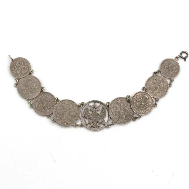 ANTIKES RUSSISCHES MÜNZ SILBER ARMBAND, MITTIG DOPPELKOPFADLER, HANDARBEIT, RUSSLAND UM CA. 1914.