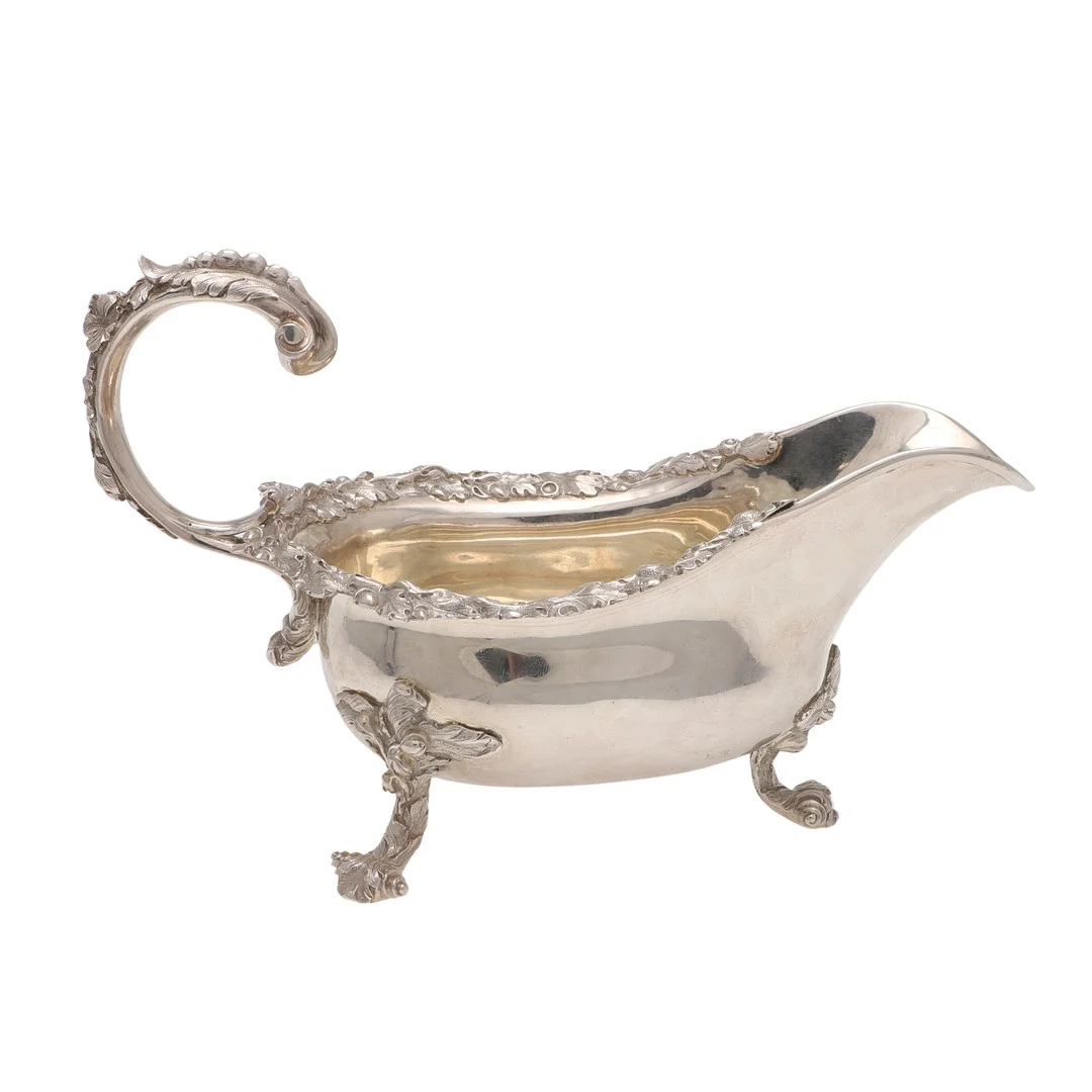 A GEORGE IV SILVER SAUCE BOAT. — Silver — Lawrences Auctioneers