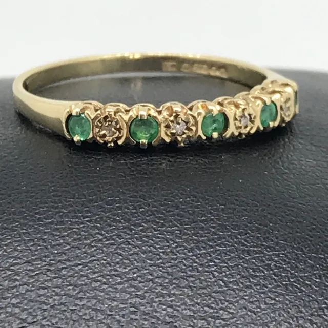 VINTAGE EMERALD & DIAMOND 9 STONE RING.