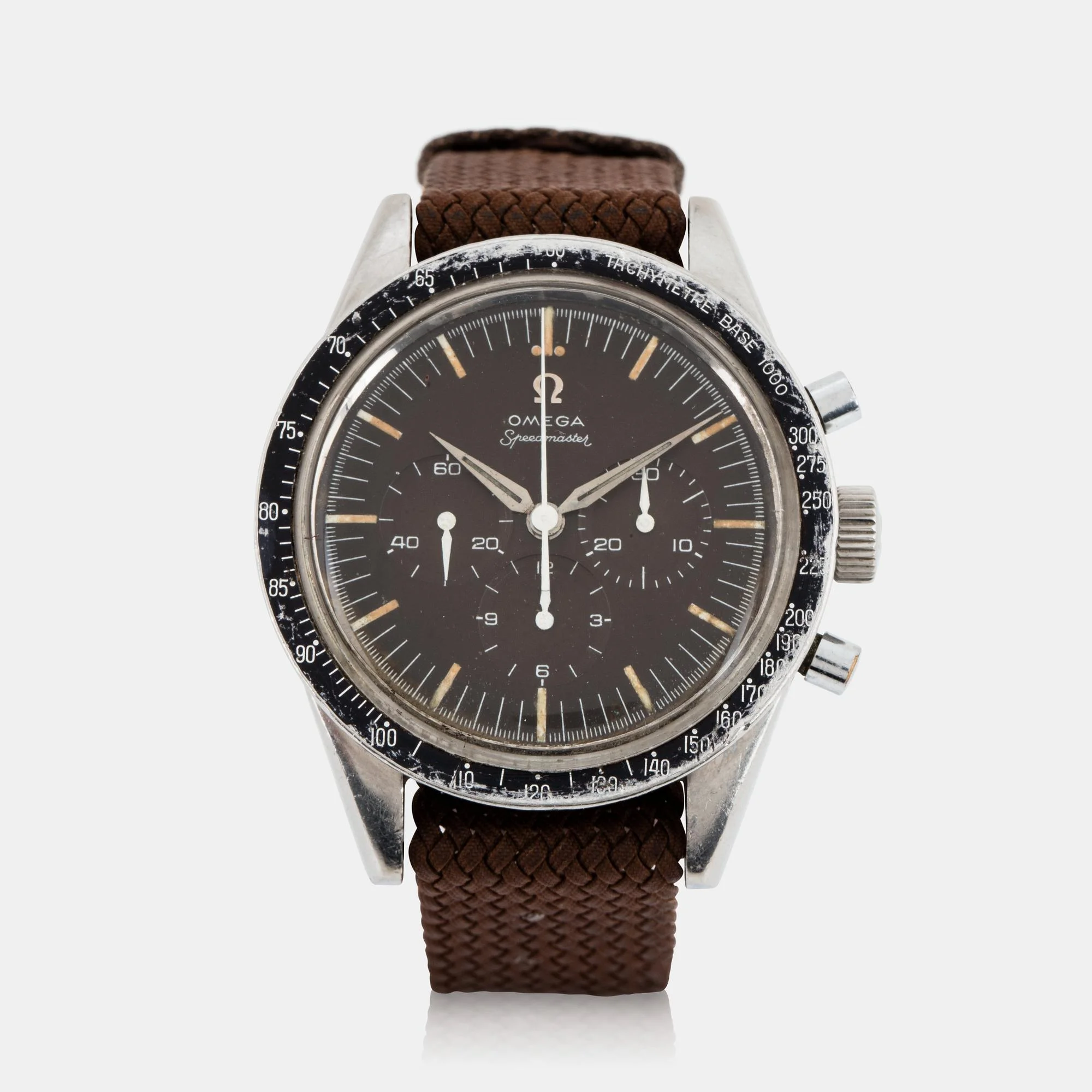 Omega, Speedmaster, kronograf, "Tachymètre - Base 1000", "Tropical Dial". — Bukowskis