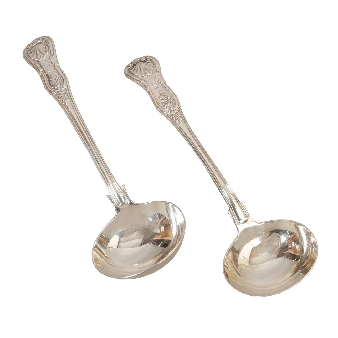 A WILLIAM IV AND A VICTORIAN SILVER LADLE (2). — Silver — Bishop & Miller