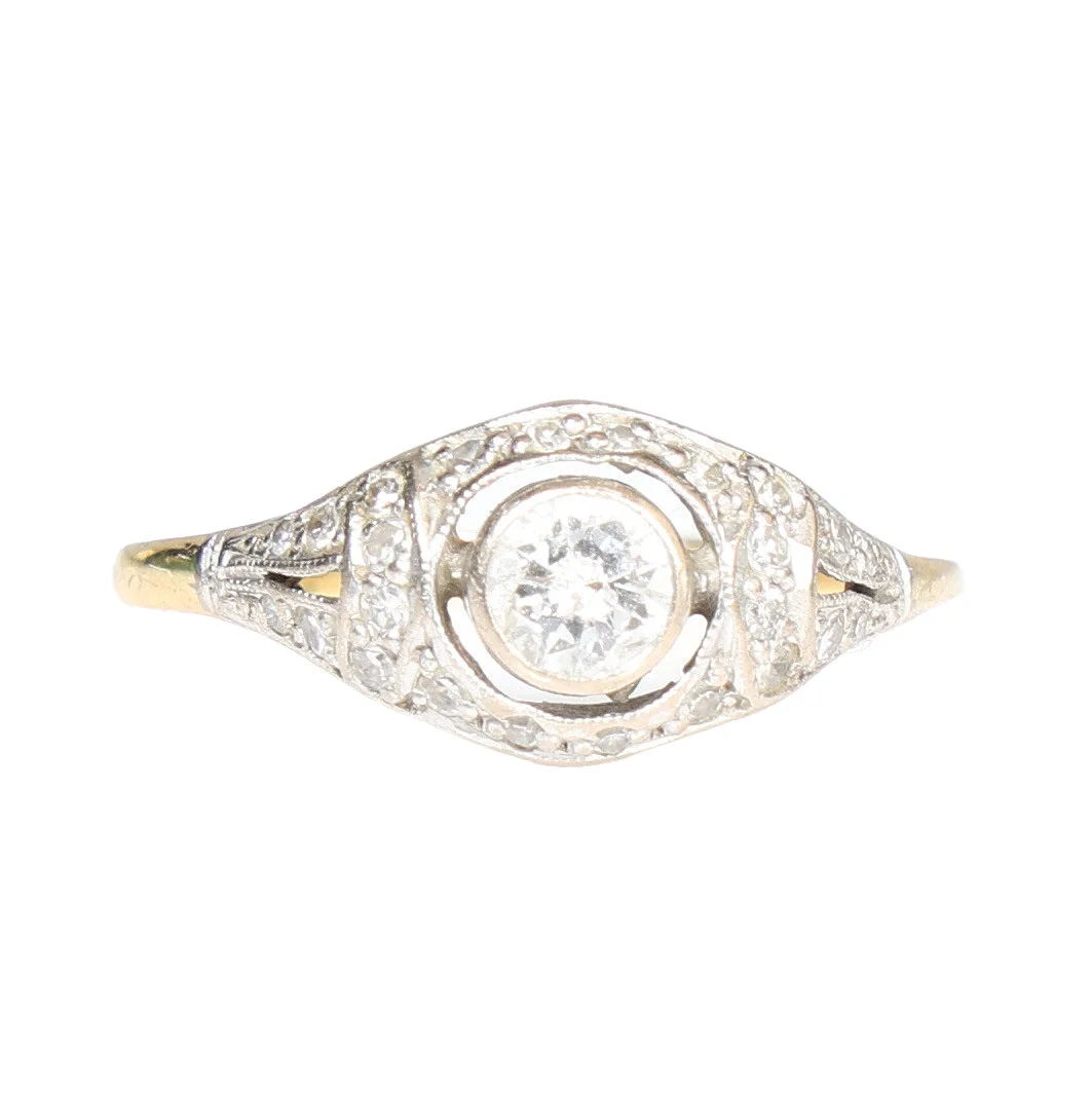 AN 18 CARAT GOLD AND DIAMOND SET RING. — Rings — Bishop & Miller