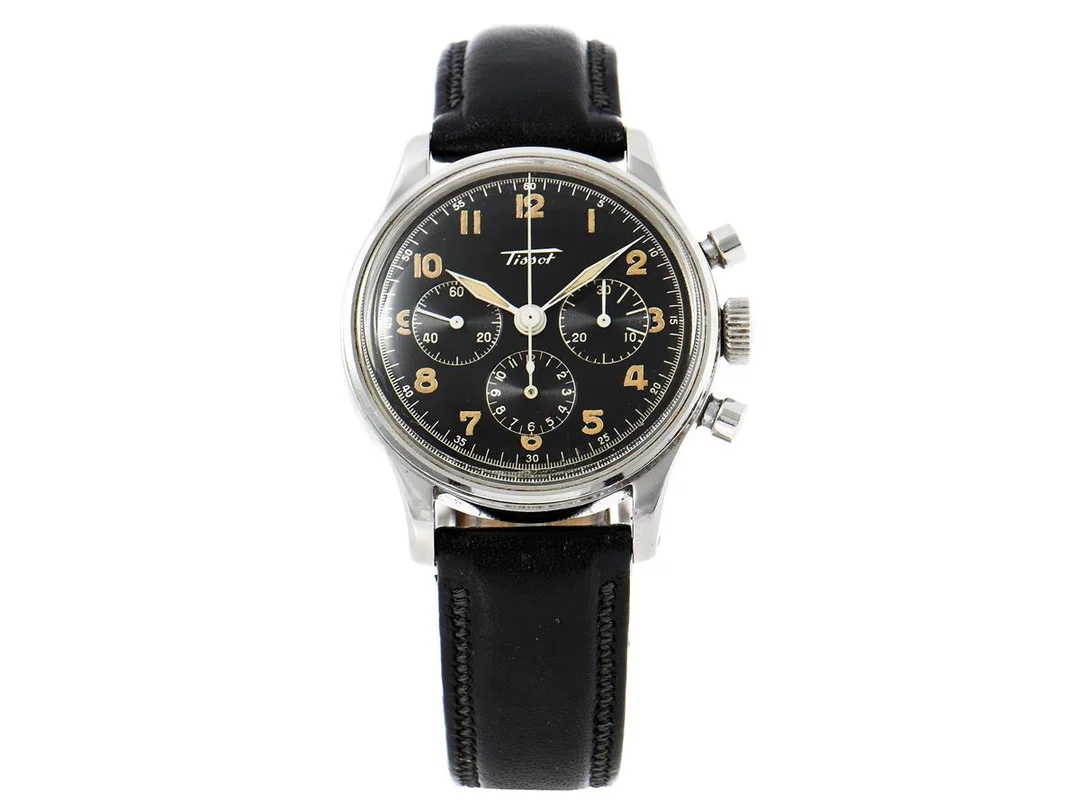 TISSOT, kronograf, herrur, 35 mm, Cal C27-41H (Lemania), Verk nr. 13929, Serie nr. 1618860, Boett nr. 6216-2 (36), stål, manuell, plexiglas, läderband, ca 1945. — Klockor/Tissot — Kaplans