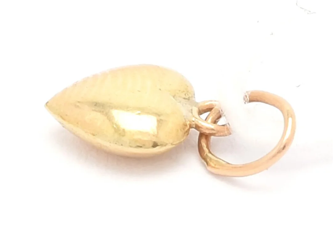 Hänge 18K 0,1g, höjd 1,0 cm, bredd 6 mm, hjärta — Smycken/Hänge — Kaplans