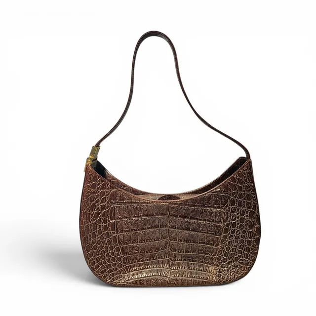 Pierre Cardin. Bolso de una asa en piel color marrón.