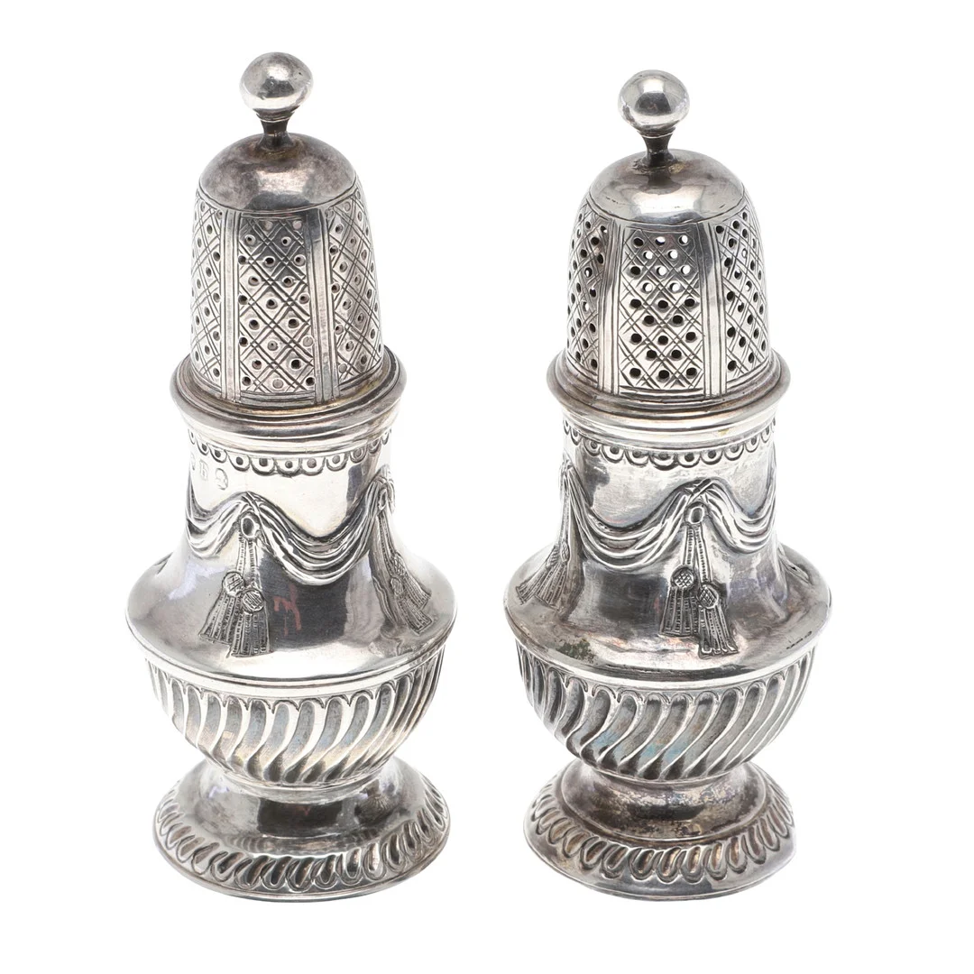 A MATCHED PAIR OF SILVER CASTERS. — Silver — Lawrences Auctioneers