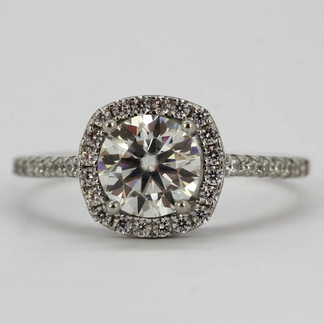 SILVER AND MOISSANITE RING. — Rings — Chalkwell Auctions