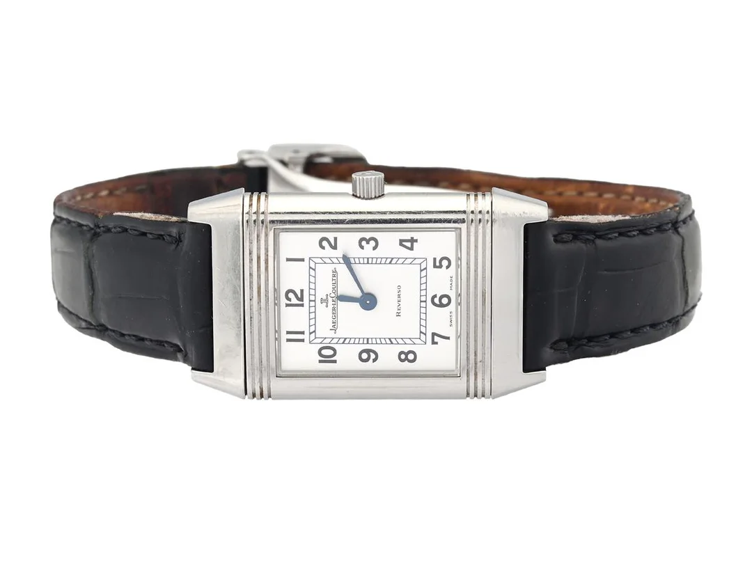 JAEGER-LECOULTRE, Reverso Classique, Cal 608 (H 1137), Verk nr. 3260329, Serie nr. 2193123, Ref nr. 261.84.20, Boett nr. 260.8.08, damur, 19,5 x 28,5 (33) mm, stål, quartz, safirglas, läderband, viklås, cert, april 2005, box, ytterkartong. — Klockor/Jaeger-Le Coultre — Kaplans