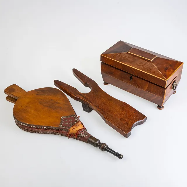 A GEORGIAN MAHOGANY TEA CADDY, BELLOWS AND A BOOT PULL.