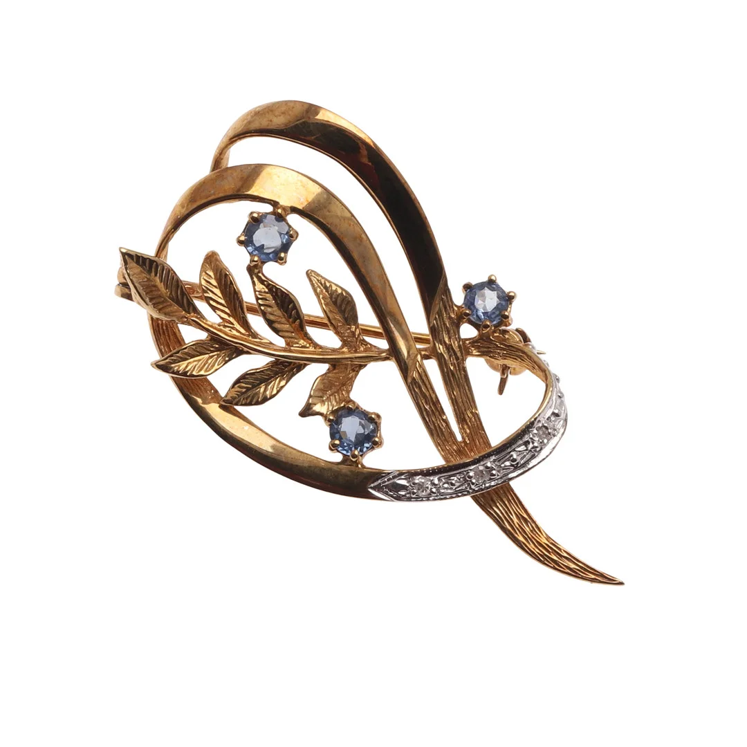 A SAPPHIRE, DIAMOND AND GOLD FOLIATE SPRAY BROOCH. — Brooches & Pendants — Lawrences Auctioneers