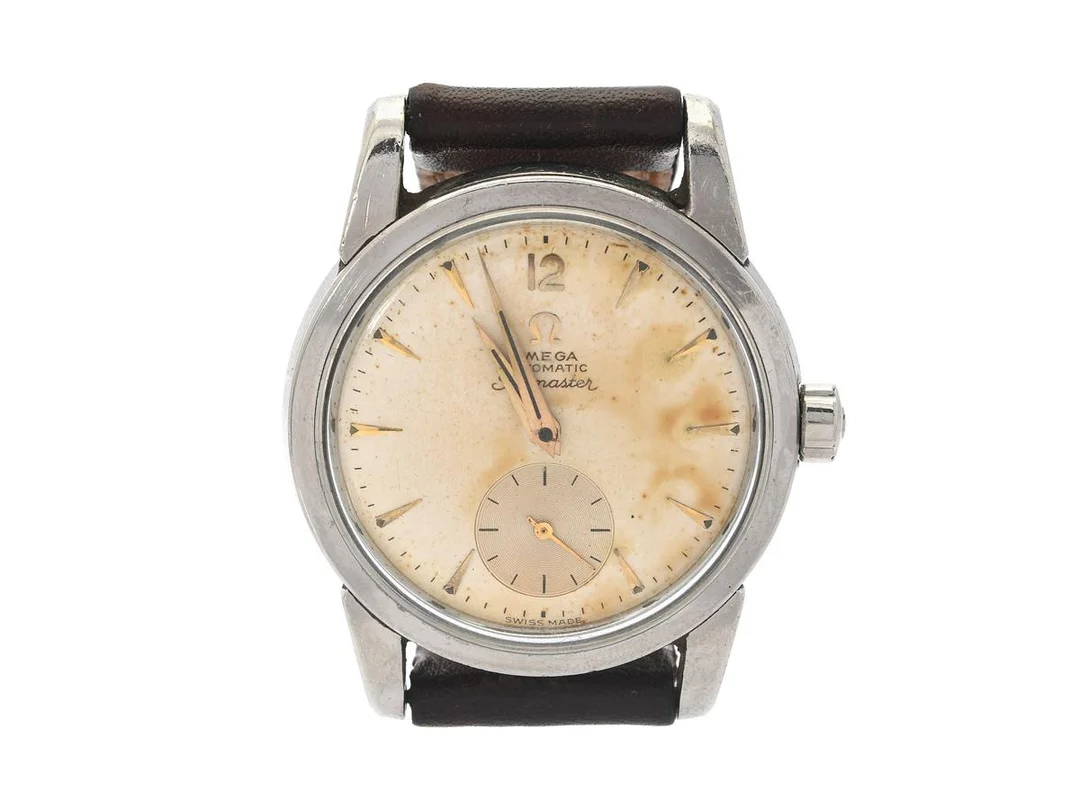 OMEGA, Seamaster, Cal 491, Serie nr. 14666320, Ref nr. CK 2848, Boett nr. 2848 1, herrur, 34 mm, stål, automatisk, plexigas, liten sekundvisare, skadad urtavla, defekt (går ej, akut servicebehov), läderband, ca 1955. — Klockor/Omega — Kaplans