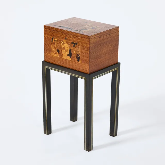 BIRGER EKMAN. Cigarrskrin, Mjölby Intarsia 1942, Swedish Modern, fanérad i jakaranda med intarsiadekor, svärtad benställning med iläggningar i tenn.