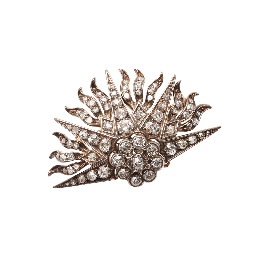 A VICTORIAN RISING SUN BROOCH. — Brooches & Pendants — Lawrences Auctioneers