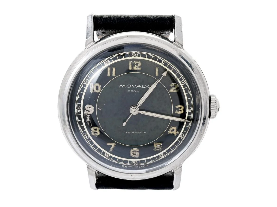MOVADO, Sport, "Francois Borgel Case", Cal 260, Boett nr. 260221 / 18603, herrur, 35 mm, stål, manuell, plexiglas, renoverade visare, skadad urtavla, läderband, ca 1950. — Klockor/Movado — Kaplans