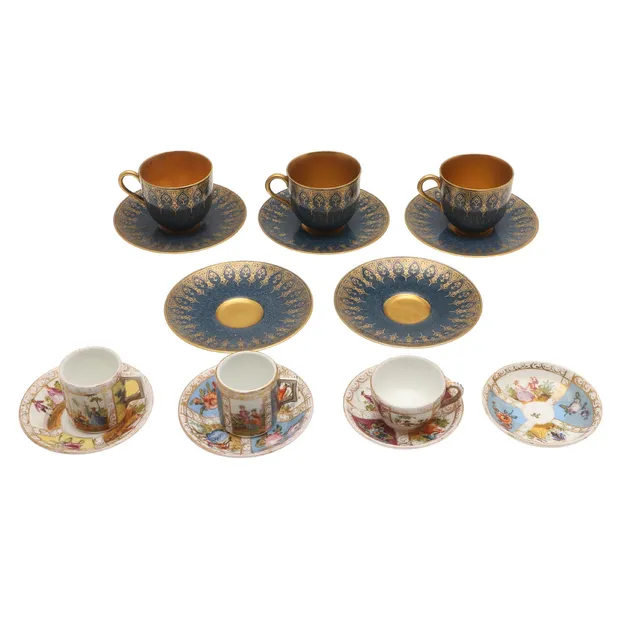 A COLLECTION OF DRESDEN MINIATURE CUPS AND SAUCERS.